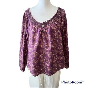 Ashley Judd purple flowered off the shoulder blouse